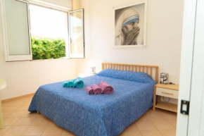 Casetta Leo camera matrimoniale in appartamento condiviso Villaggio Azzurro